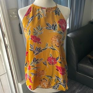 Beautiful and vibrant floral top with keyhole front and peekaboo back